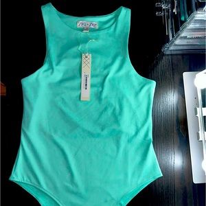 Brand new bodysuit that I bought from a local boutique! Has never been worn!